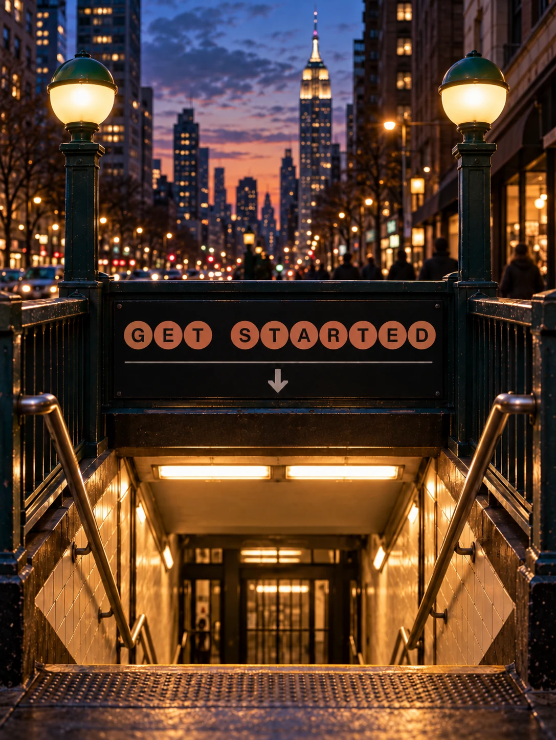 An illuminated New York subway entrance with a Get Started sign above the stairs